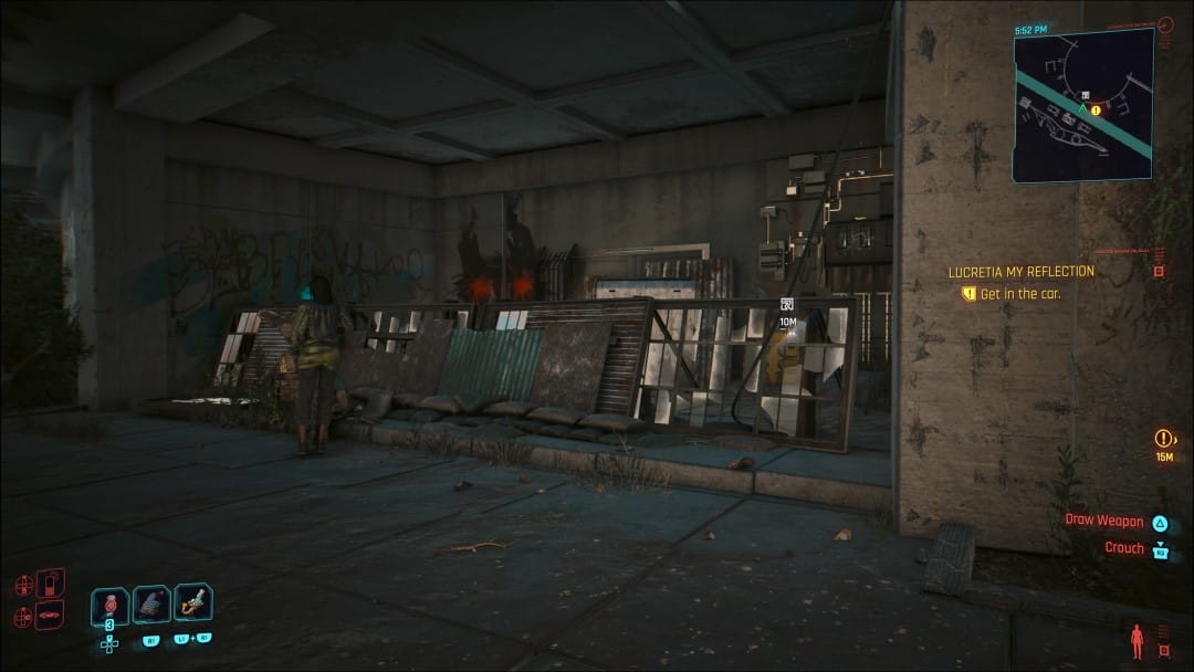 A Relic Cache seen behind a wall of sheet metal and junk from Cyberpunk 2077 Phantom Liberty 