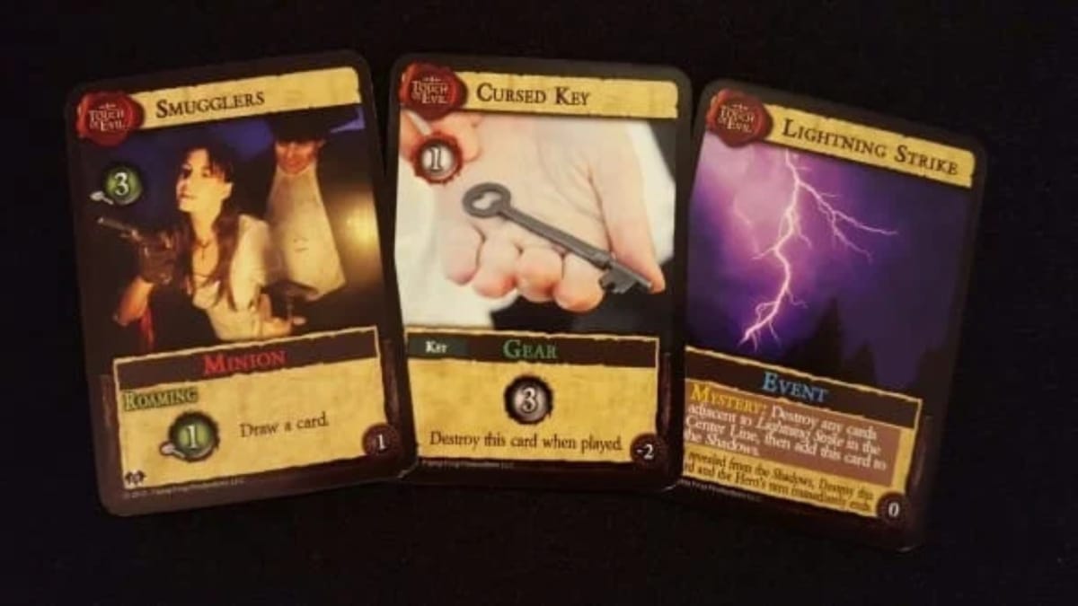Dark Gothic Colonial Horror photo showing a handful of different cards used in the game, each featuring a manipulated photo to illustrate what the card represents