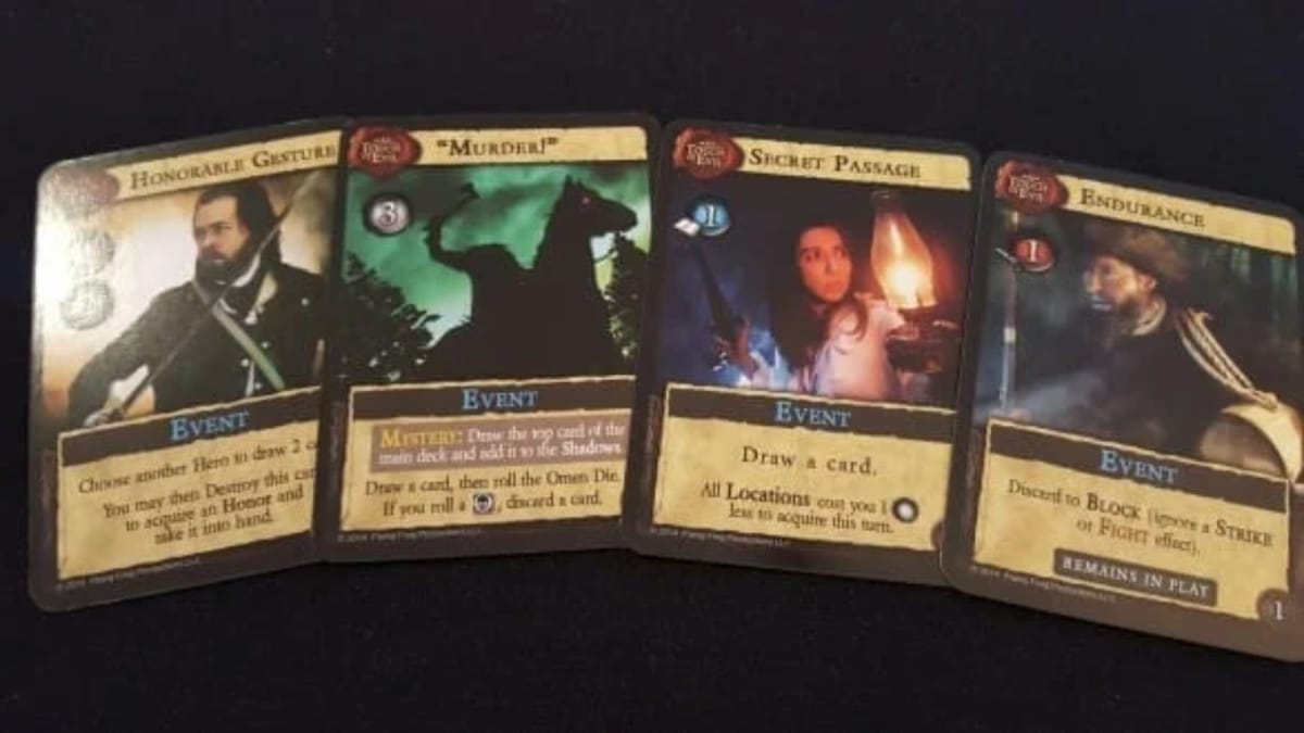 Dark Gothic photo showing several event cards each with grim artwork depicting people items and monsters 