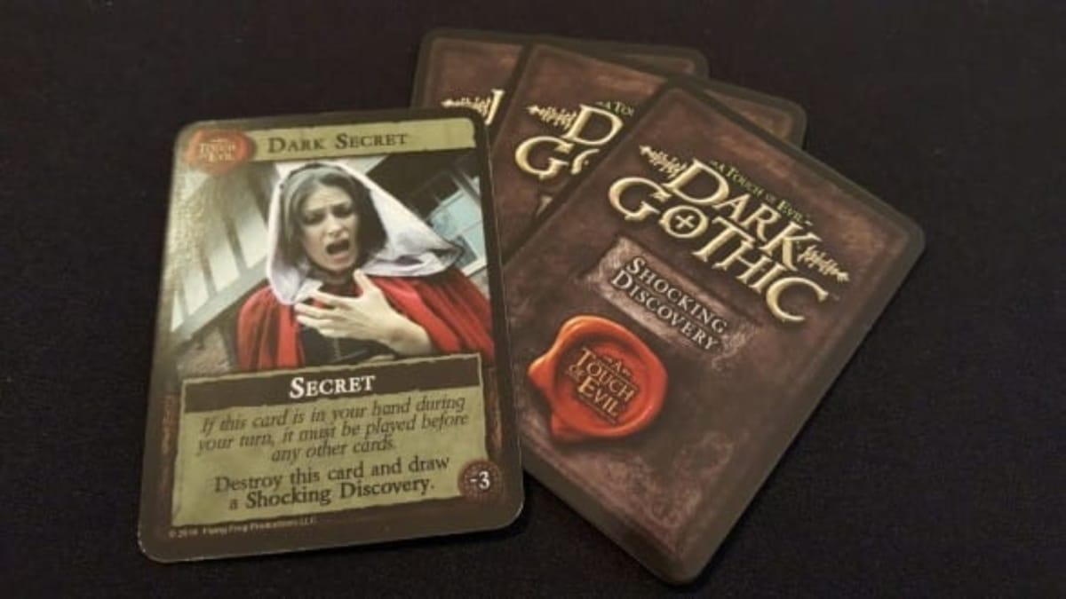 Dark Gothic photo showing some dark secret cards, each containing a different secret that will effect a player