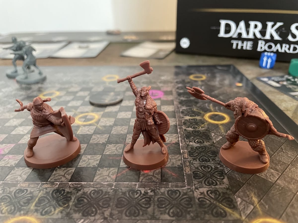 An image from our Dark Souls: The Board Game - Sunless City Review featuring the three heroes.