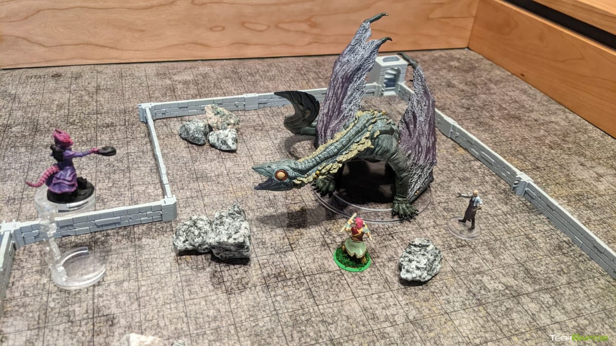 A mock battle between players and the Adult Deep Dragon