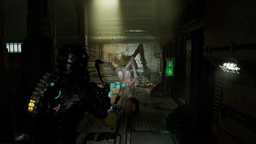Gameplay from Dead Space 2023 showing Isaac Clarke aiming a flamethrower at a Phantom Slasher enemy