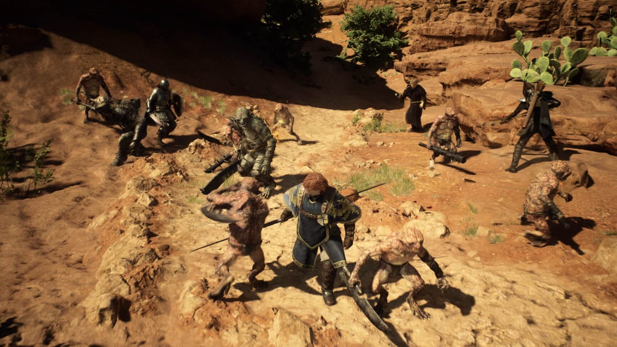 The Arisen and their pawns doing battle with goblins in a rocky desert environment in Dragon's Dogma 2