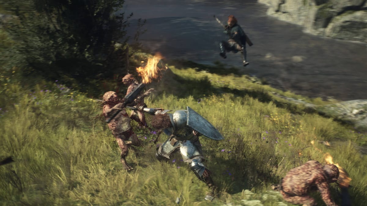 The player fighting off some goblins in a grassy area in Dragon's Dogma 2