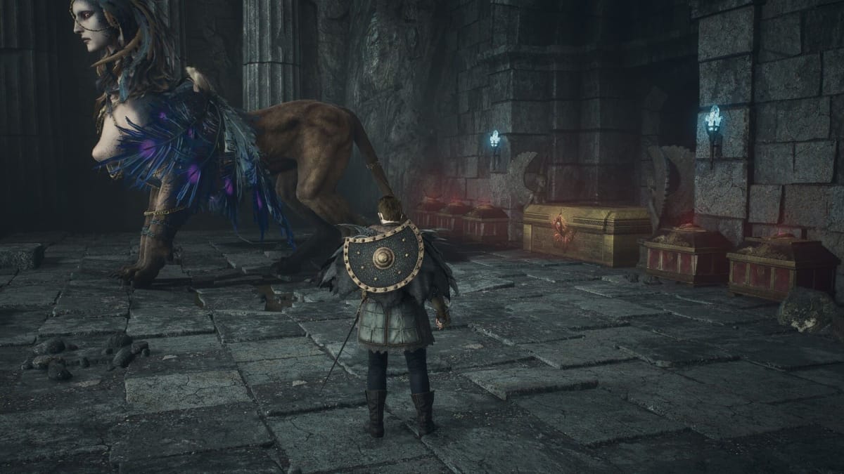 Image of the Sphinx in Dragon's Dogma 2 With A Set Of Chests Behind Her