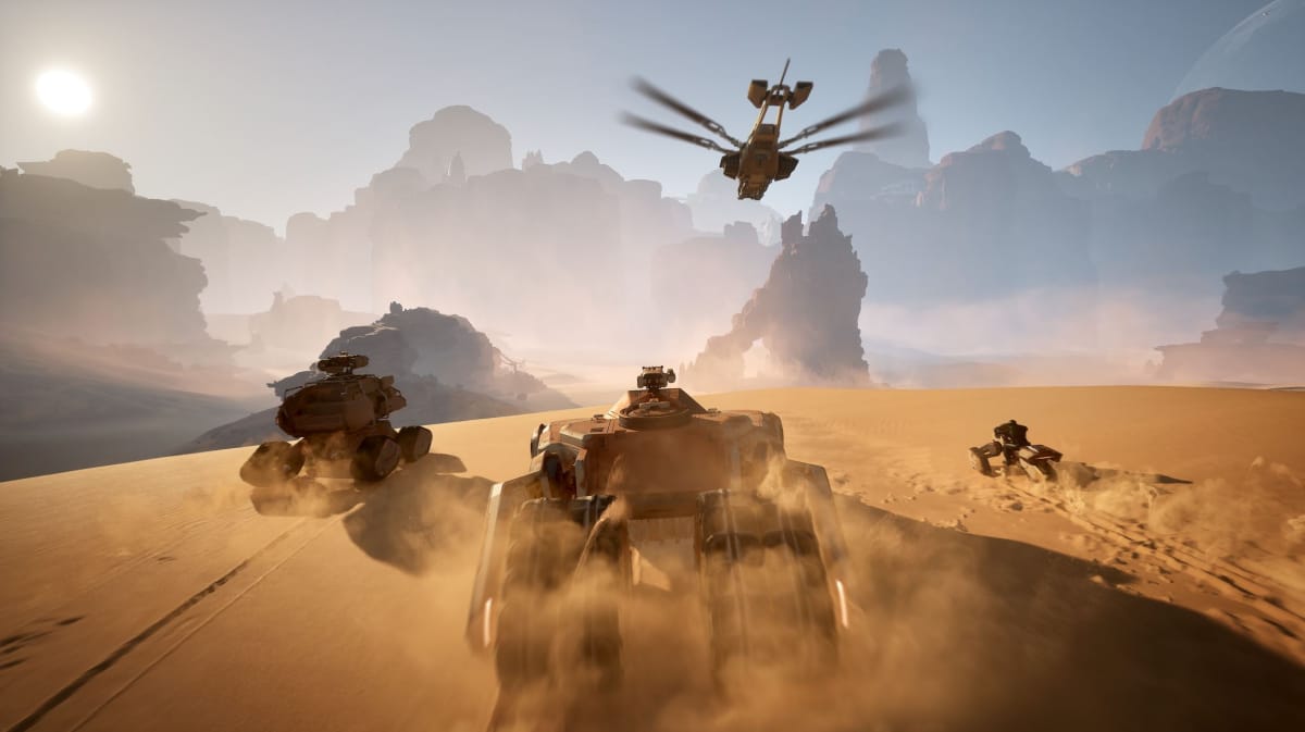 Vehicles navigating the desert in Dune Awakening