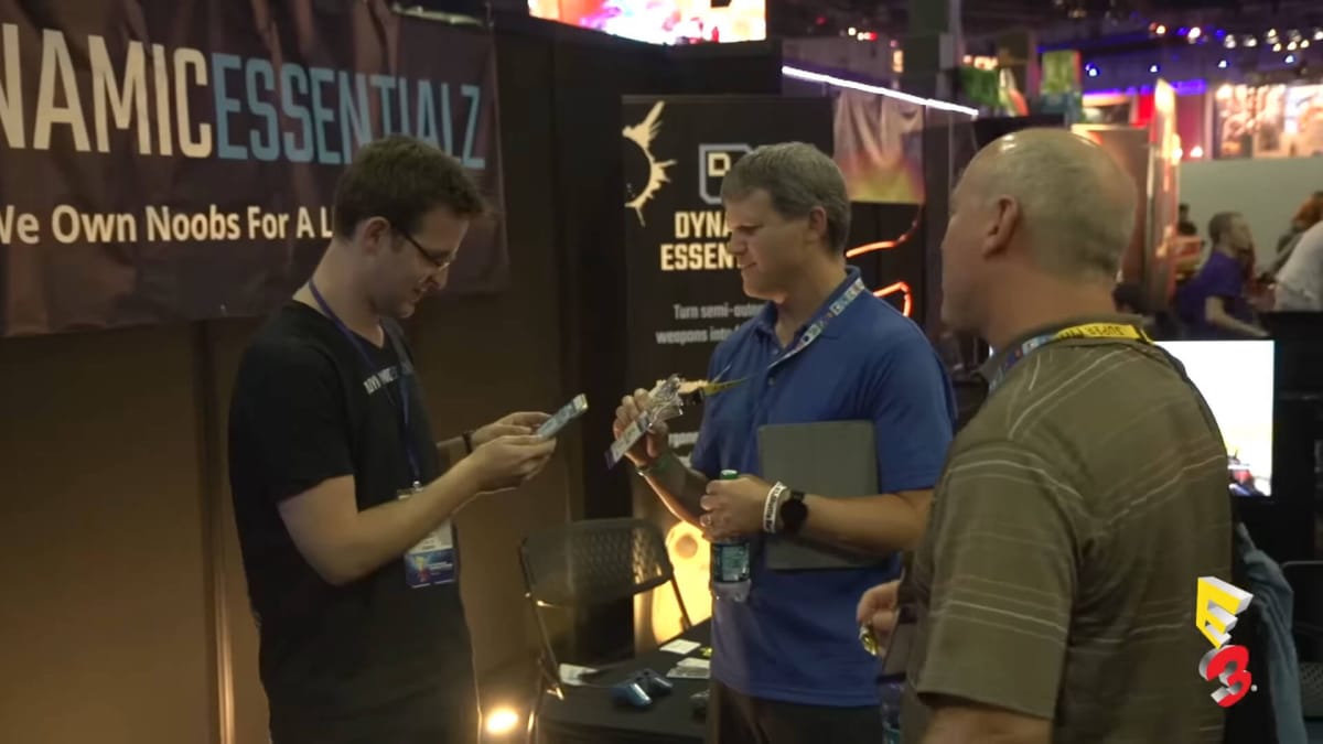 Three E3 attendees chatting at E3 2016