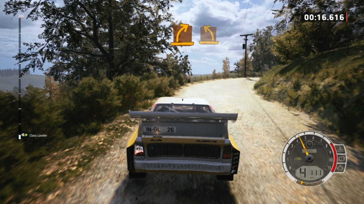 EA Sports WRC screenshot showing a white car with a spoiler rocketing through the countryside with yellow arrows indicating the oncomiing course
