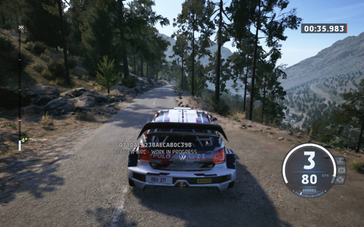 EA Sports WRC screenshot showing a white rally car from behind as it drives down a mountainous road surrounded by trees