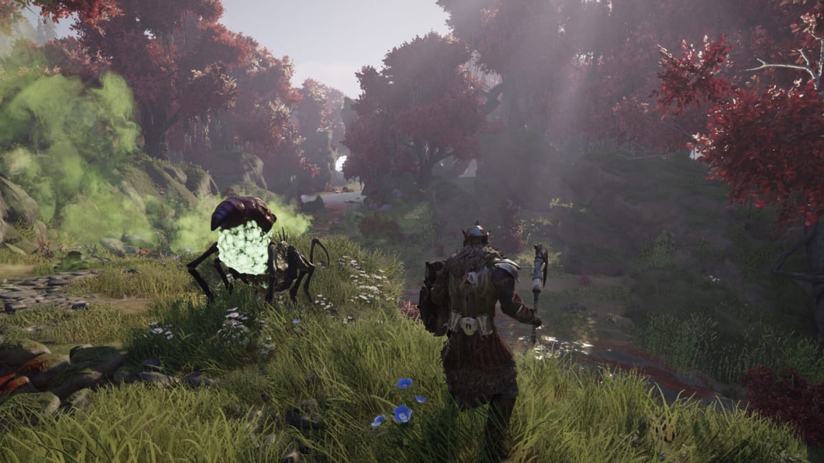 The player battling a monster in a verdant field in Elex