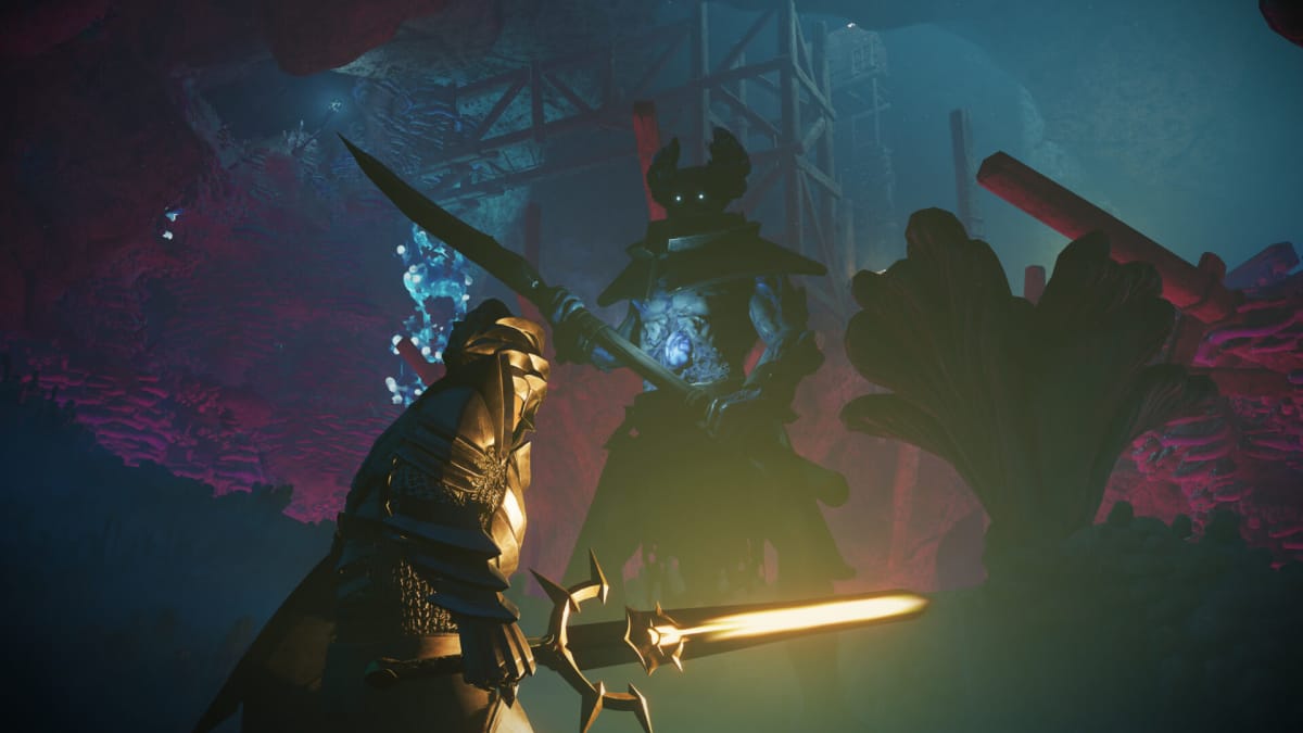 The player facing off against a demonic-looking enemy in a cave in Enshrouded