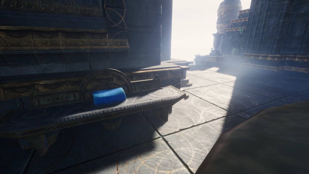 Blue Fabric sitting on a bench in an Ancient Spire in Enshrouded