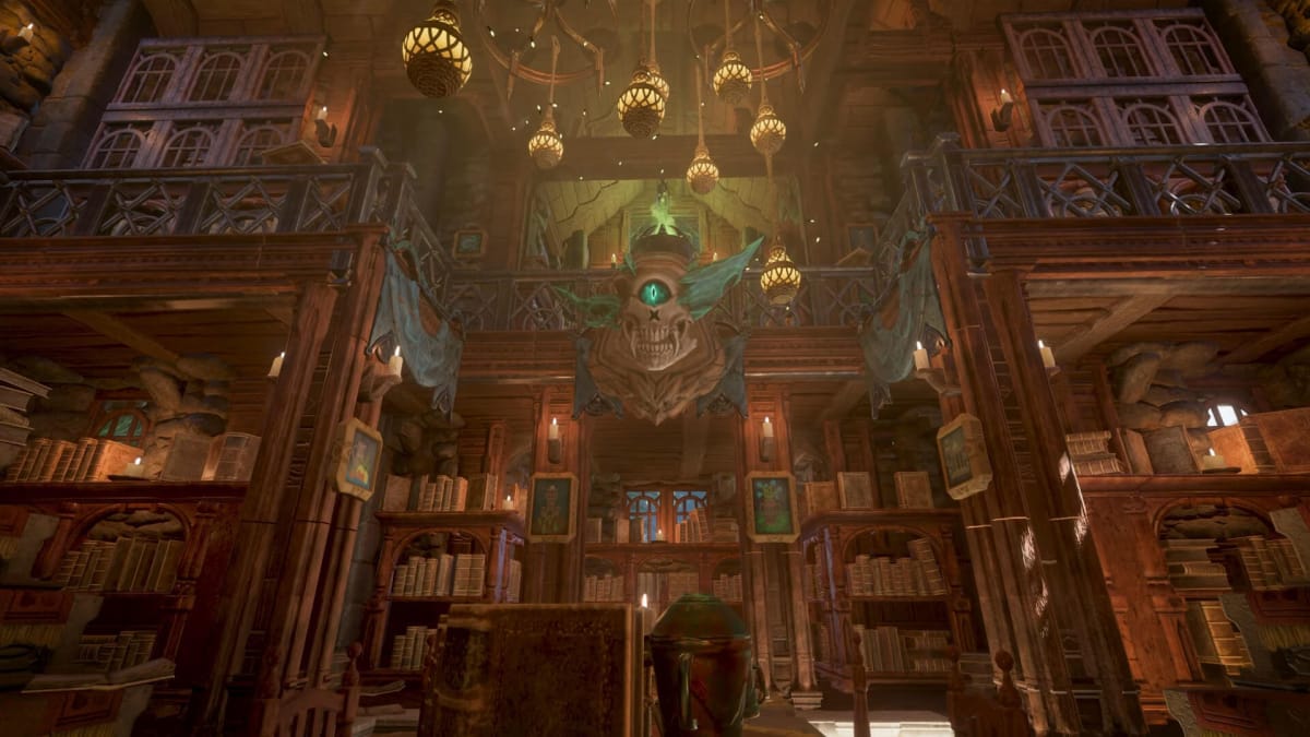 A massive library environment with lots of books and other clutter, as well as a scary-looking skull centerpiece