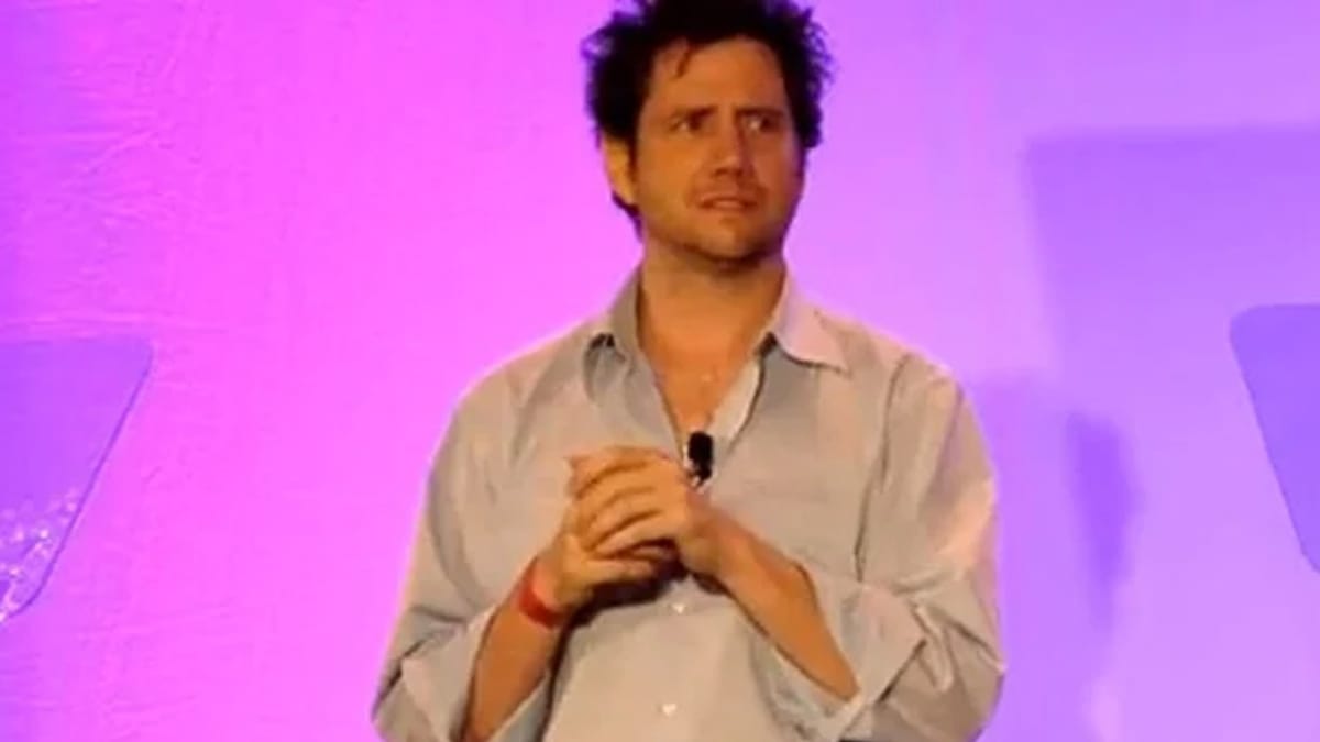 Jamie Kennedy can be seen standing awkwardly.