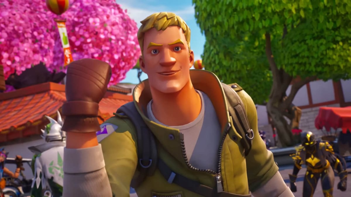 A blonde male Fortnite character making a triumphant gesture with his fist