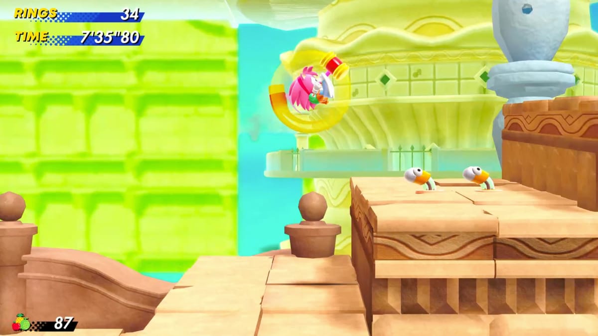 Amy Rose jumping and using her Hammer Ability in a Tropical Zone from Sonic Superstars