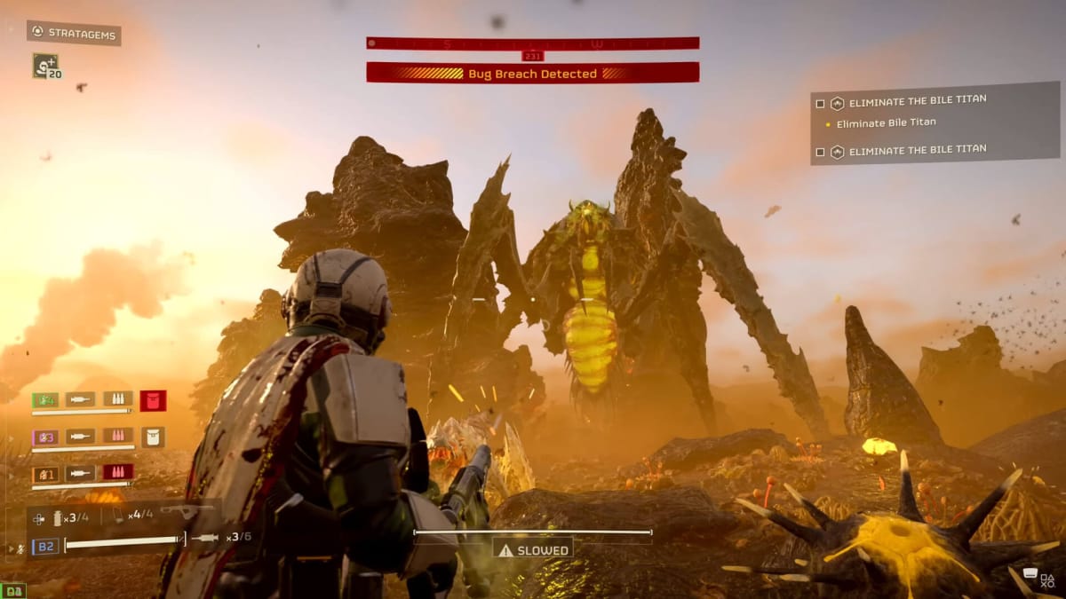The player fighting a Bile Titan in Helldivers 2