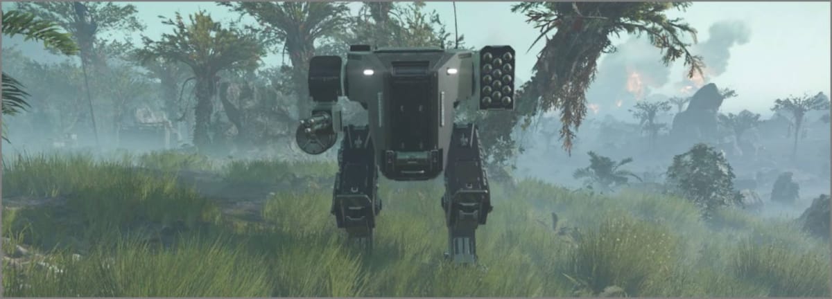 A deployed EXO-45 Patriot Exosuit facing the camera on a grassy jungle planet in Helldivers 2