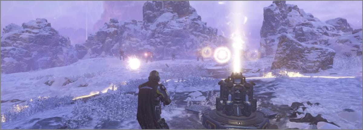The Shield Generator Relay blocking incoming red laser fire from approaching Automatons in Helldivers 2