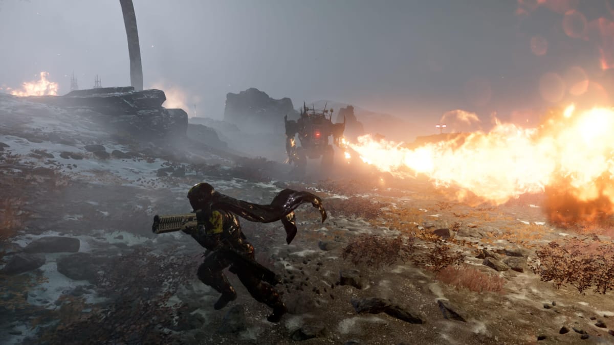 The player running while a mech sprays fire in Helldivers 2