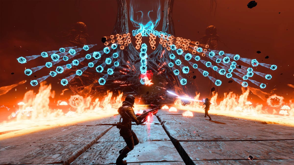 Selene dodging a boss' orange and blue attacks in Returnal, a game worked on by Housemarque's Harry Krueger