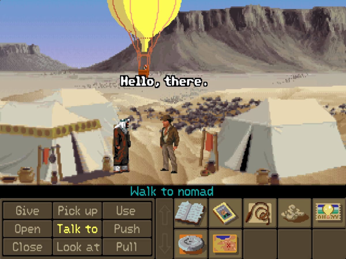 Indiana Jones talking to a nomad in Indiana Jones and the Fate of Atlantis, another Indiana Jones game