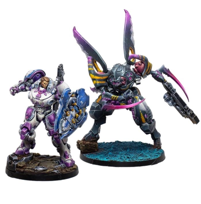 A screenshot of two promotional miniatures for Infinity: Endsong, one of a woman in bulky white armor with purple accents, and an insectoid looking mech in black armor
