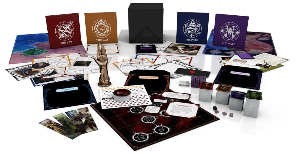 A display of physical books, tokens, and materials from the Invisible Sun: Return of the Black Cube backerkit campaign