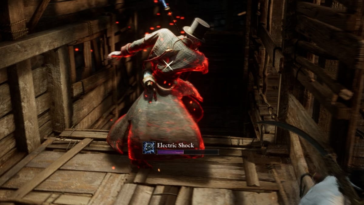 Lies of P screenshot showing a top-hat-wearing enemy glowing red as they tense up for an attack