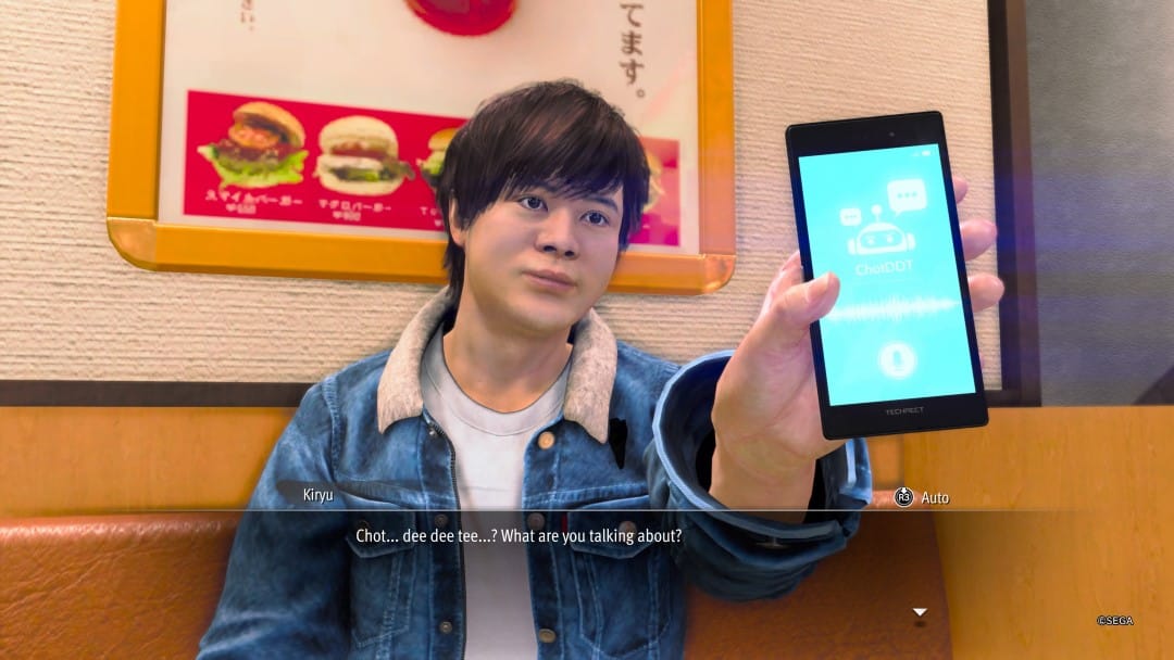 A kid holding up a smart phone with a an ersatz Chat GPT app from Like A Dragon Gaiden: The Man Who Erased His Name