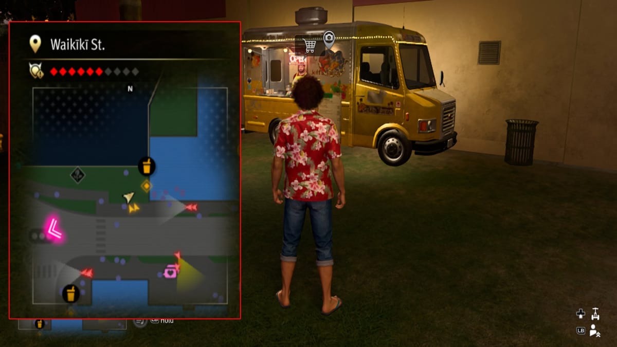 like a dragon infinite wealth screenshot showing a map reference and a golden food truck in the background
