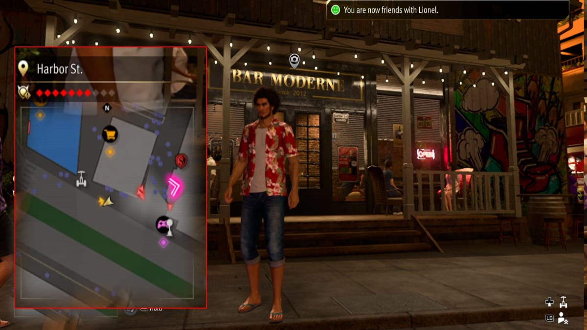 like a dragon infinite wealth screenshot with a map reference and a modern cafe bar behind a man in a red hawain shirt