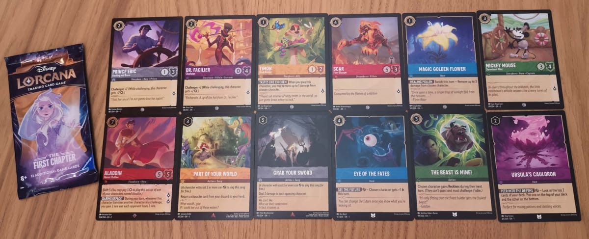The 12 Disney Lorcana Cards in our First Chapter Booster Pack 9.