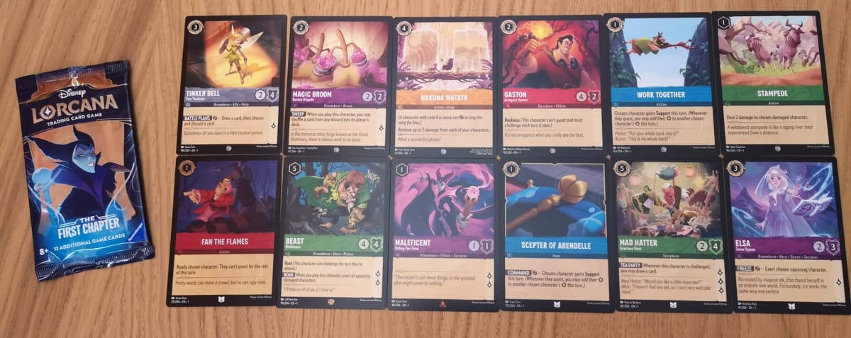 The 12 Disney Lorcana Cards in our First Chapter Booster Pack 11.