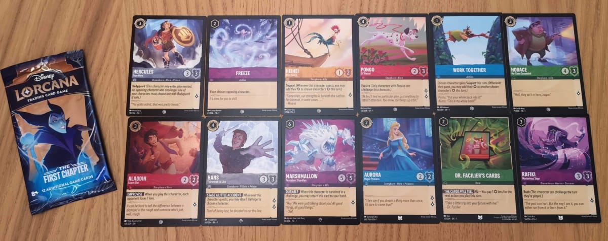 The 12 Disney Lorcana Cards in our First Chapter Booster Pack 12.