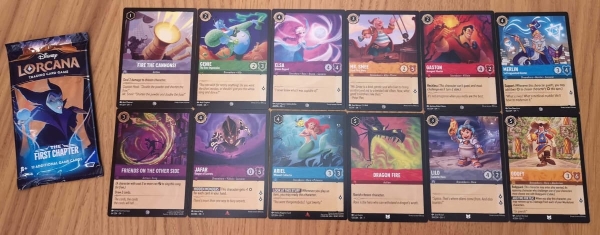 The 12 Disney Lorcana Cards in our First Chapter Booster Pack 17.