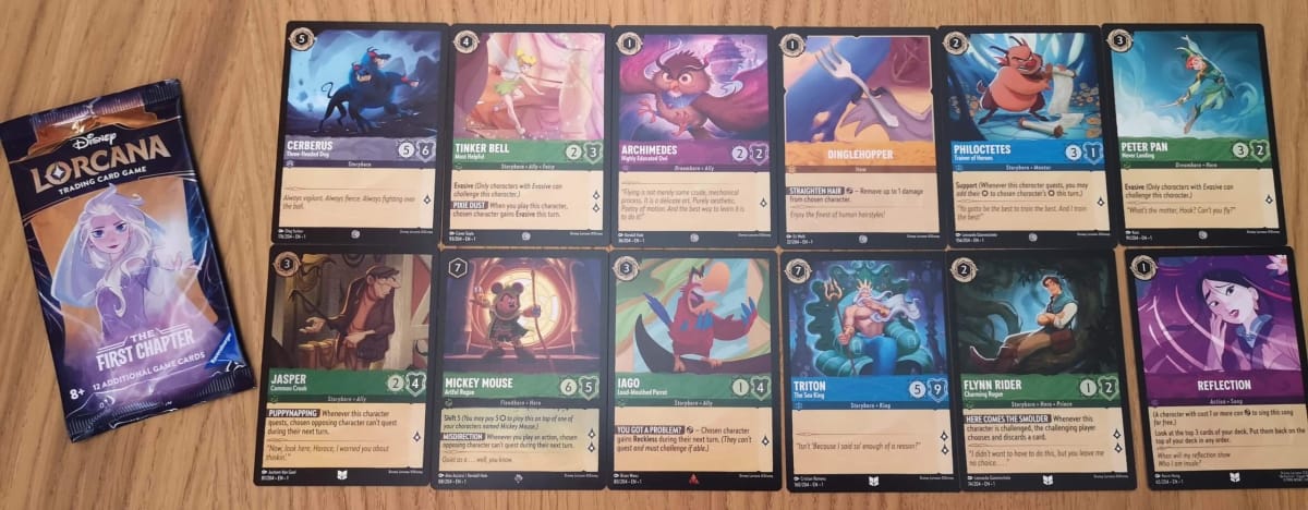 The 12 Disney Lorcana Cards in our First Chapter Booster Pack 18.