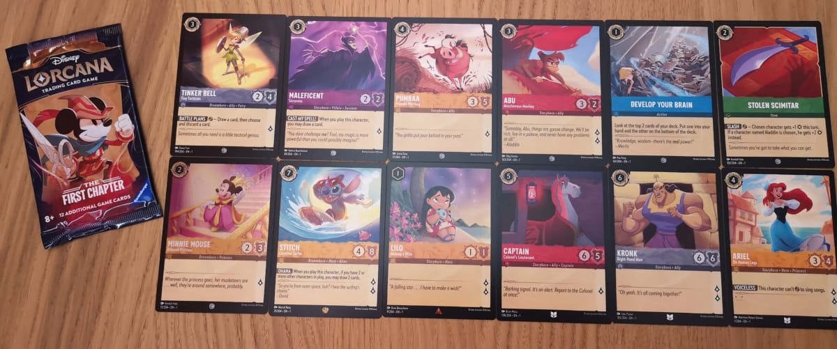 The 12 Disney Lorcana Cards in our First Chapter Booster Pack 19.