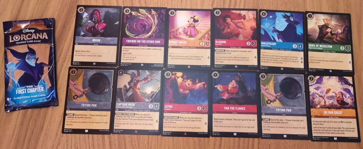The 12 Disney Lorcana Cards in our First Chapter Booster Pack 20.