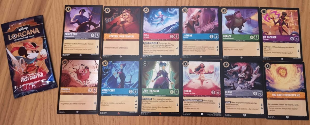 The 12 Disney Lorcana Cards in our First Chapter Booster Pack 22.