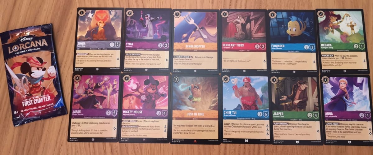 The 12 Disney Lorcana Cards in our First Chapter Booster Pack 24.