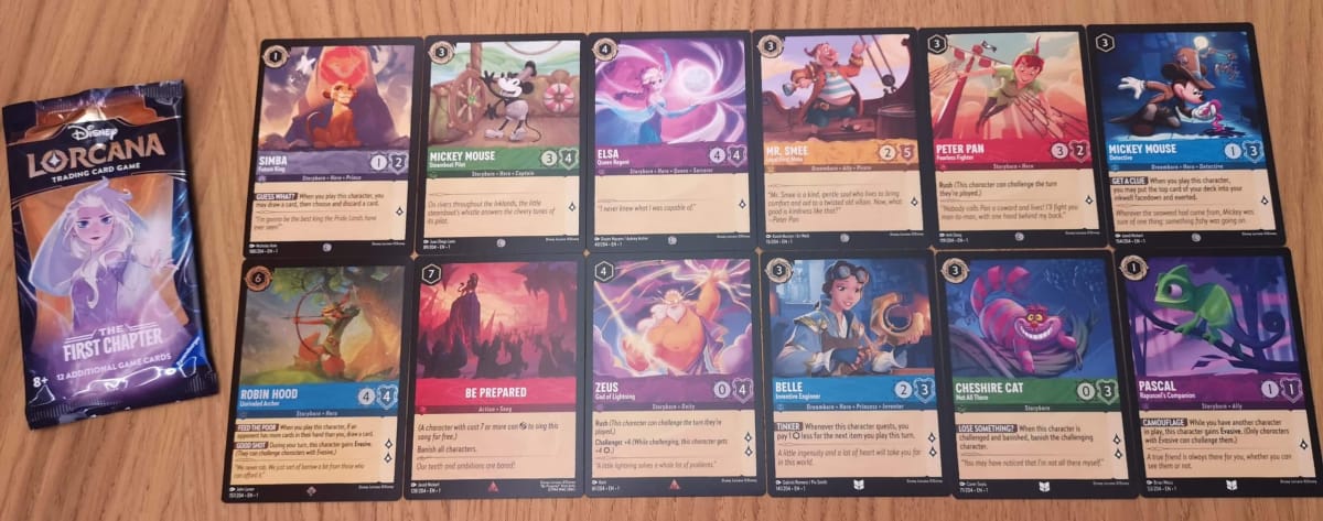 The 12 Disney Lorcana Cards in our First Chapter Booster Pack 6.