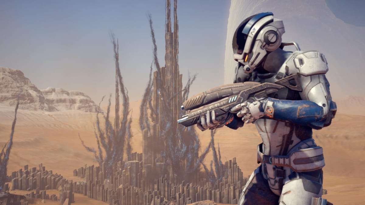 A character with a rifle looking out over a desert planet in Mass Effect: Andromeda