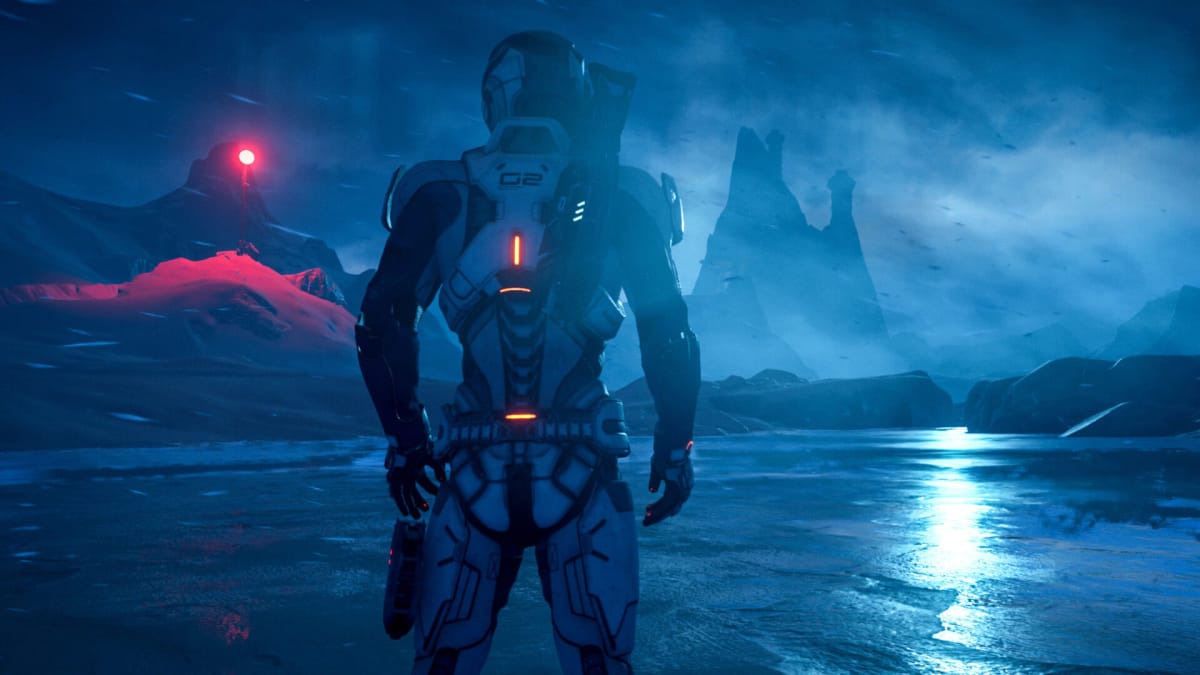 A character shot from the back and staring out over a barren planet in Mass Effect: Andromeda