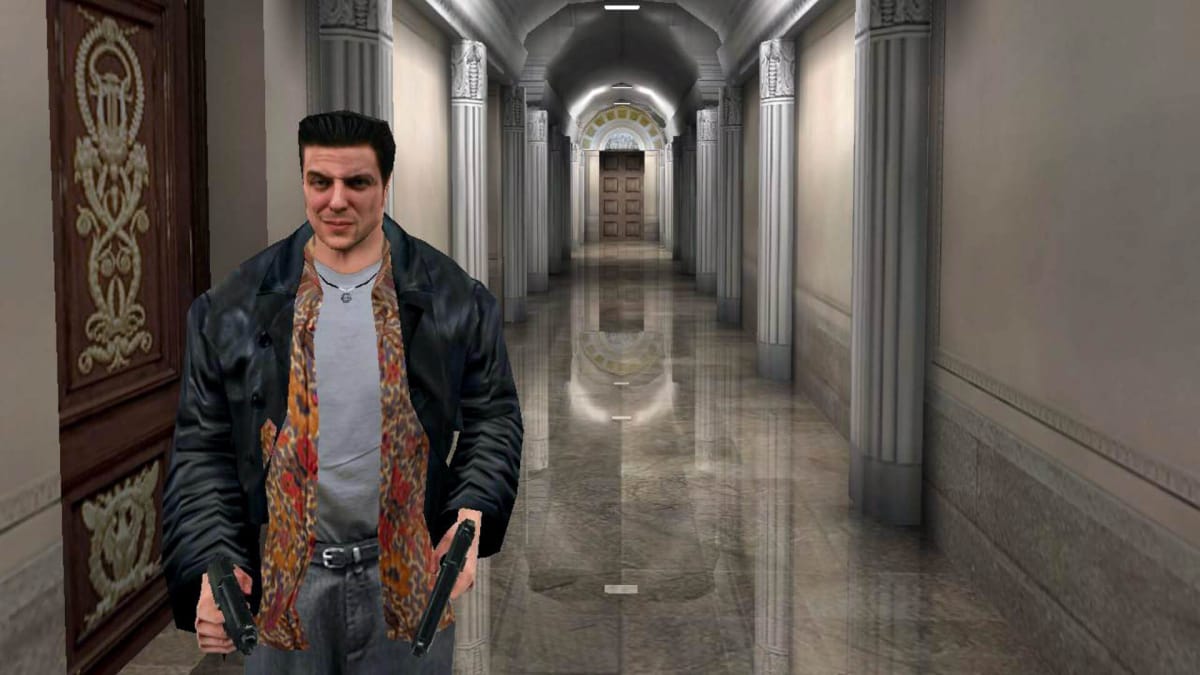 Max Payne walking towards the camera down a hallway in the titular game, developed by Remedy