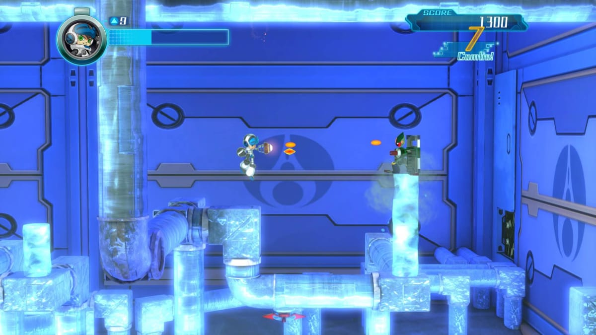 Beck shooting at a shielded enemy in an icy level in Mighty No. 9
