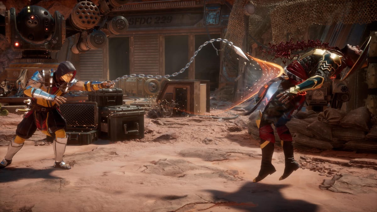 Scorpion throwing out his signature chain against Raiden in Mortal Kombat 11 Ultimate, which is at number 5 in the UK boxed sales charts