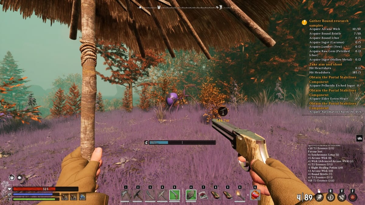Aiming a pistol at a large purple spider.