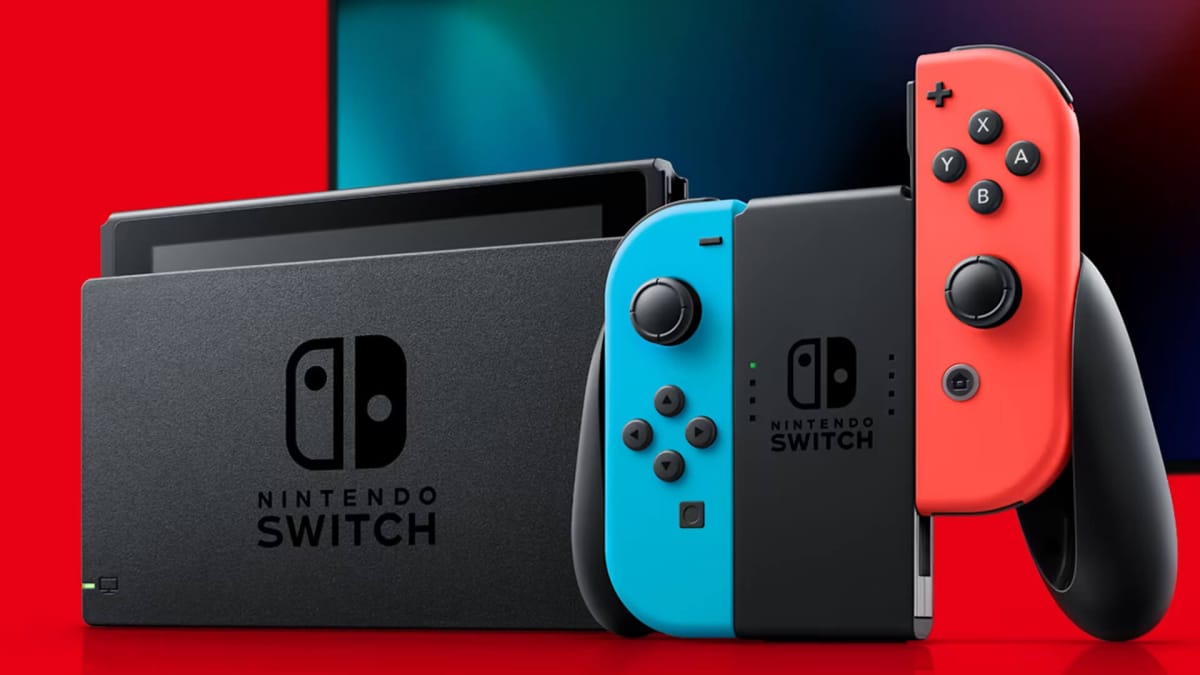 The Nintendo Switch console against a red background